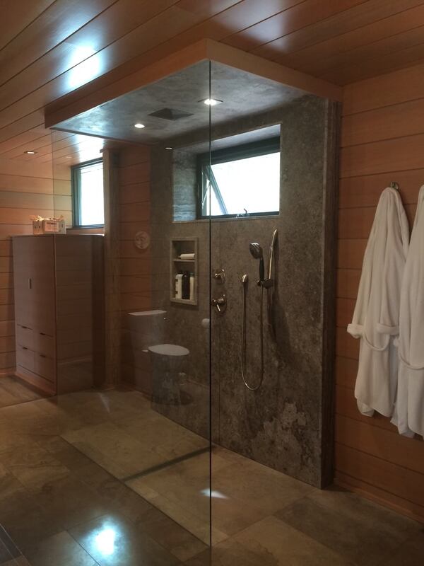 Bookmatched thin stone panel bathroom with marble walls and vanity by Designer Stone Panels — project 9