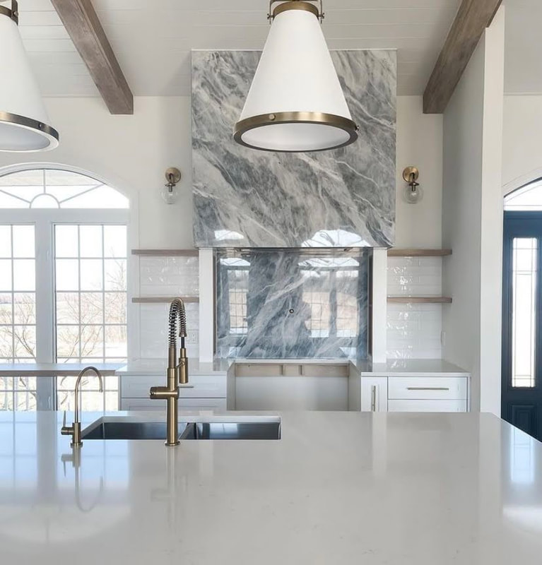 Thin natural stone kitchen backsplash with full-height bookmatched slab by Designer Stone Panels — project 4