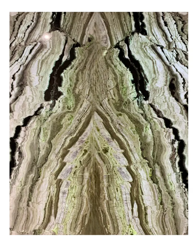 Backlit Green Wave Onyx SkinnyStone feature wall glowing from behind