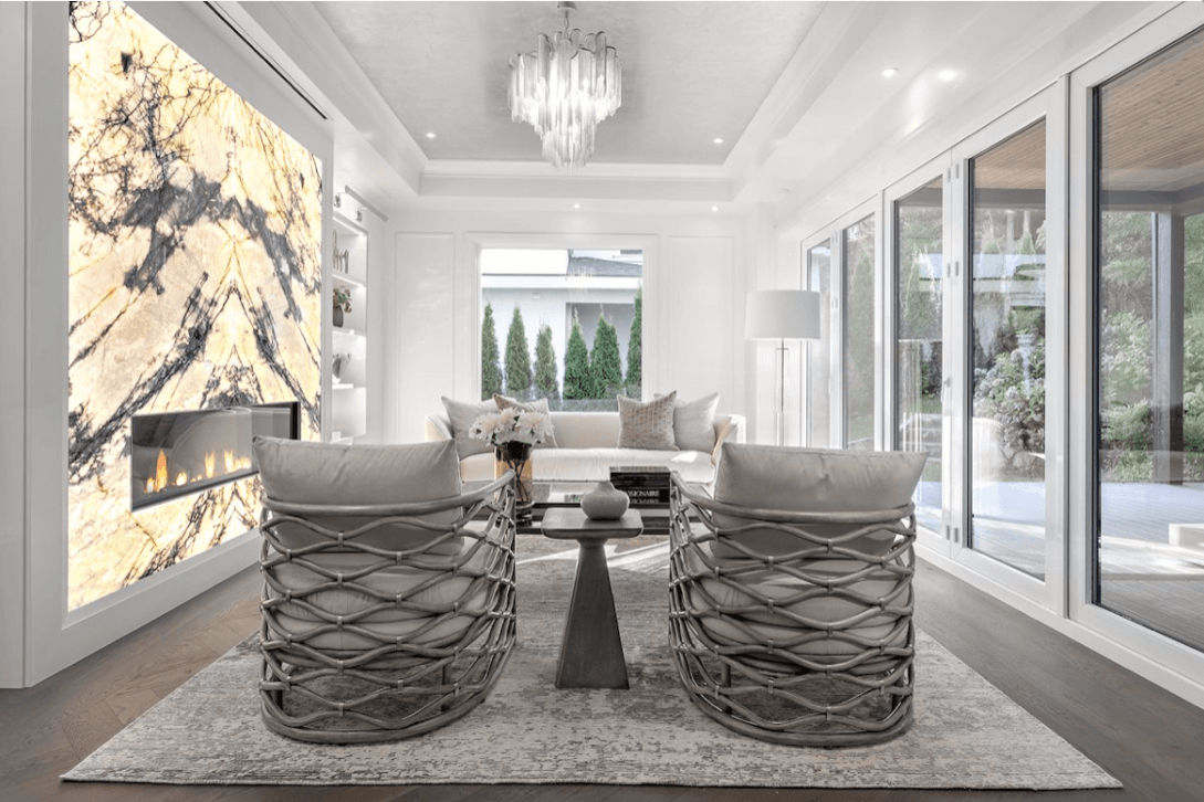 Luxury living room with backlit Zulio marble fireplace feature wall