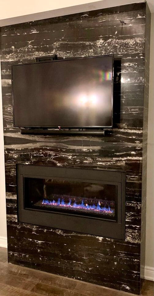 Luxury thin stone fireplace and feature wall installation in natural marble by Designer Stone Panels — project 9