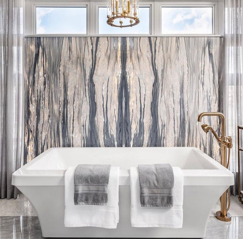 Bookmatched thin stone panel bathroom with marble walls and vanity by Designer Stone Panels — project 5
