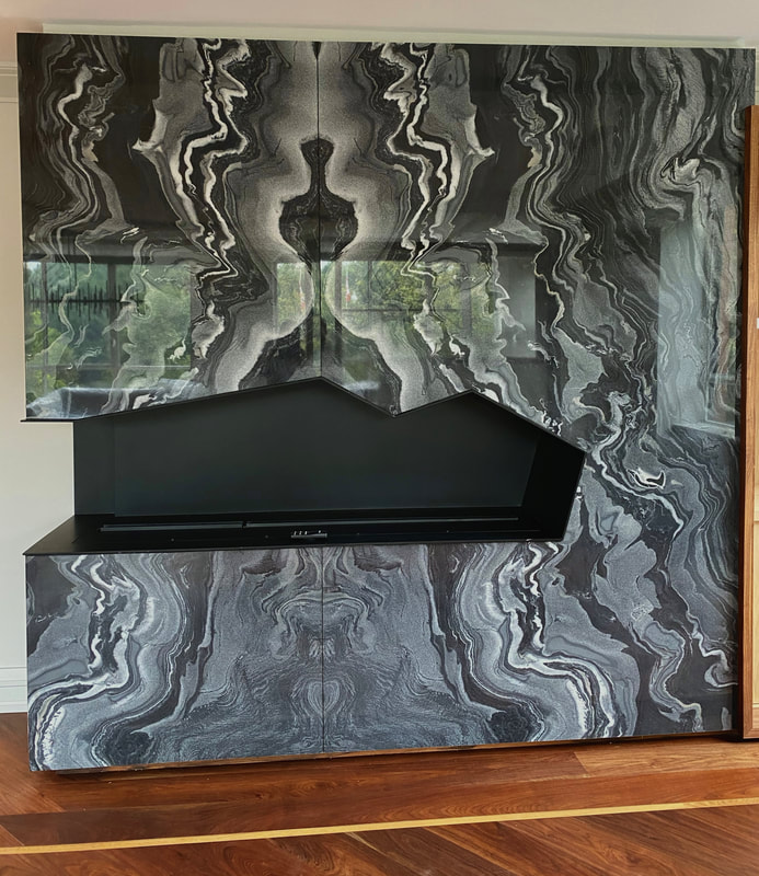 Luxury thin stone fireplace and feature wall installation in natural marble by Designer Stone Panels — project 8