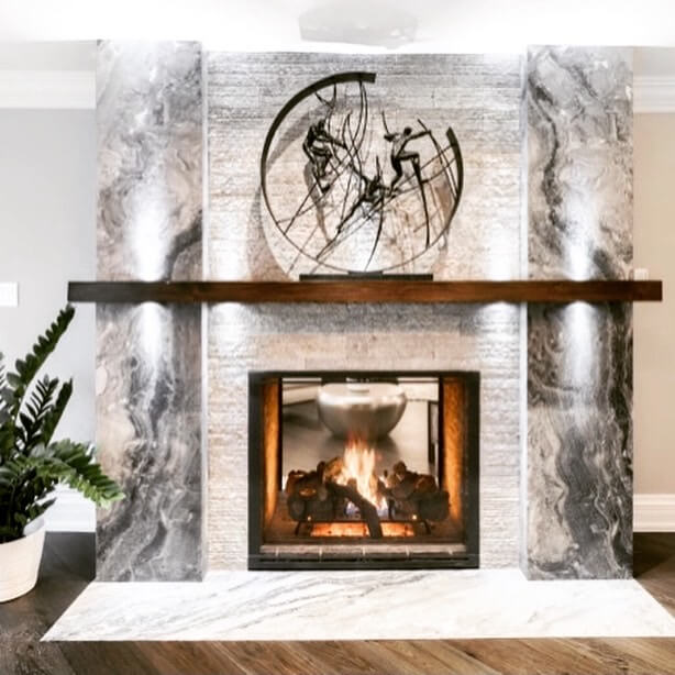 Luxury thin stone fireplace and feature wall installation in natural marble by Designer Stone Panels — project 12