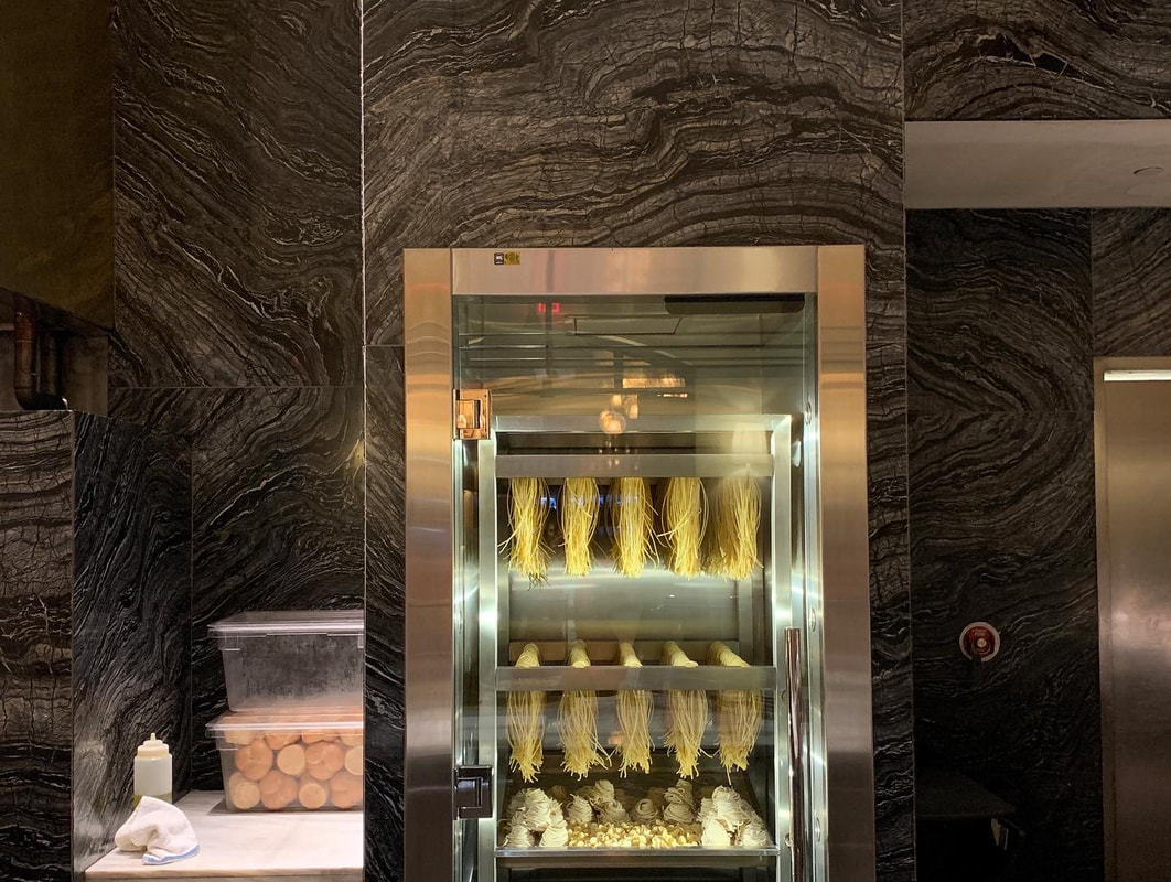 Luxury thin stone fireplace and feature wall installation in natural marble by Designer Stone Panels — project 11