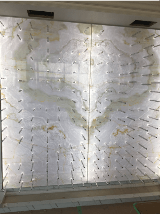 Custom wine cellar clad in thin natural stone panels by Designer Stone Panels — project 6