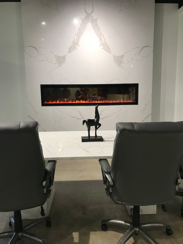 Boardroom Table with matching electric Fireplace, using DSP Marble